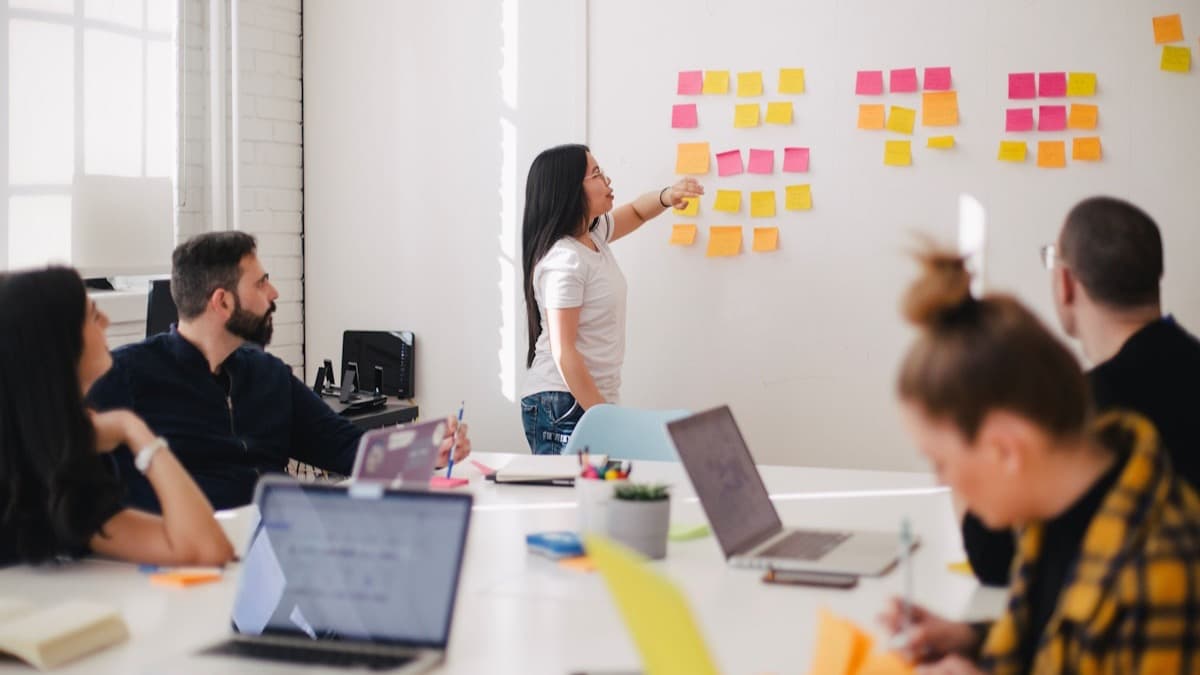 OCM consulting — a product planning session mapping ideas across a wall